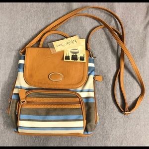 New with tags 3 in 1 convertible small purse.